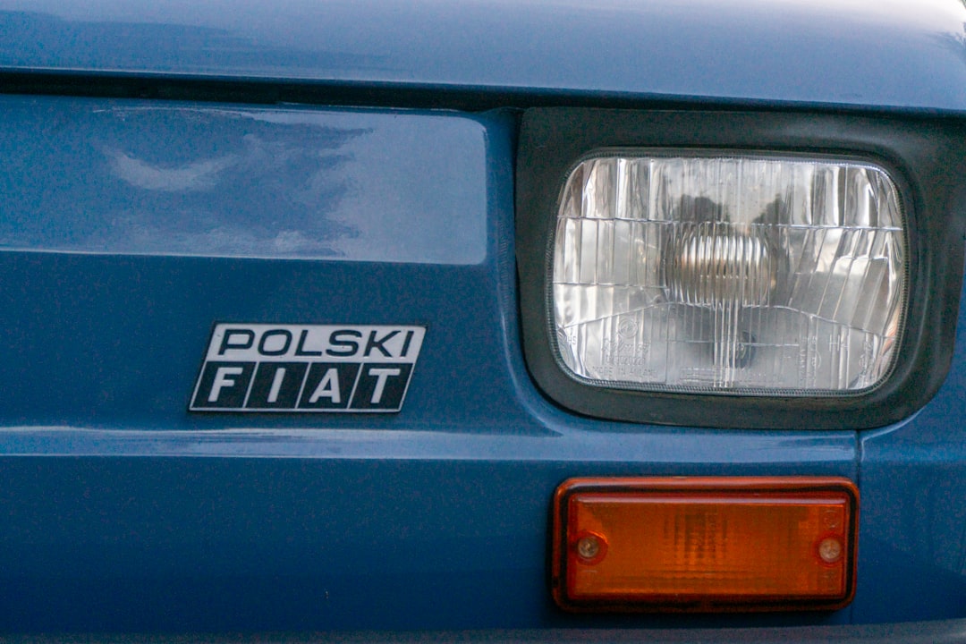 Polski fiat car emblem and headlight detail