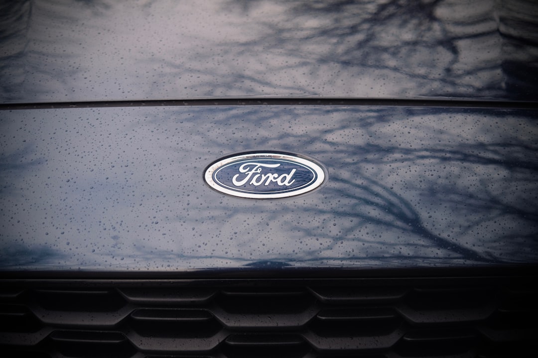 a close up of a ford emblem on a car